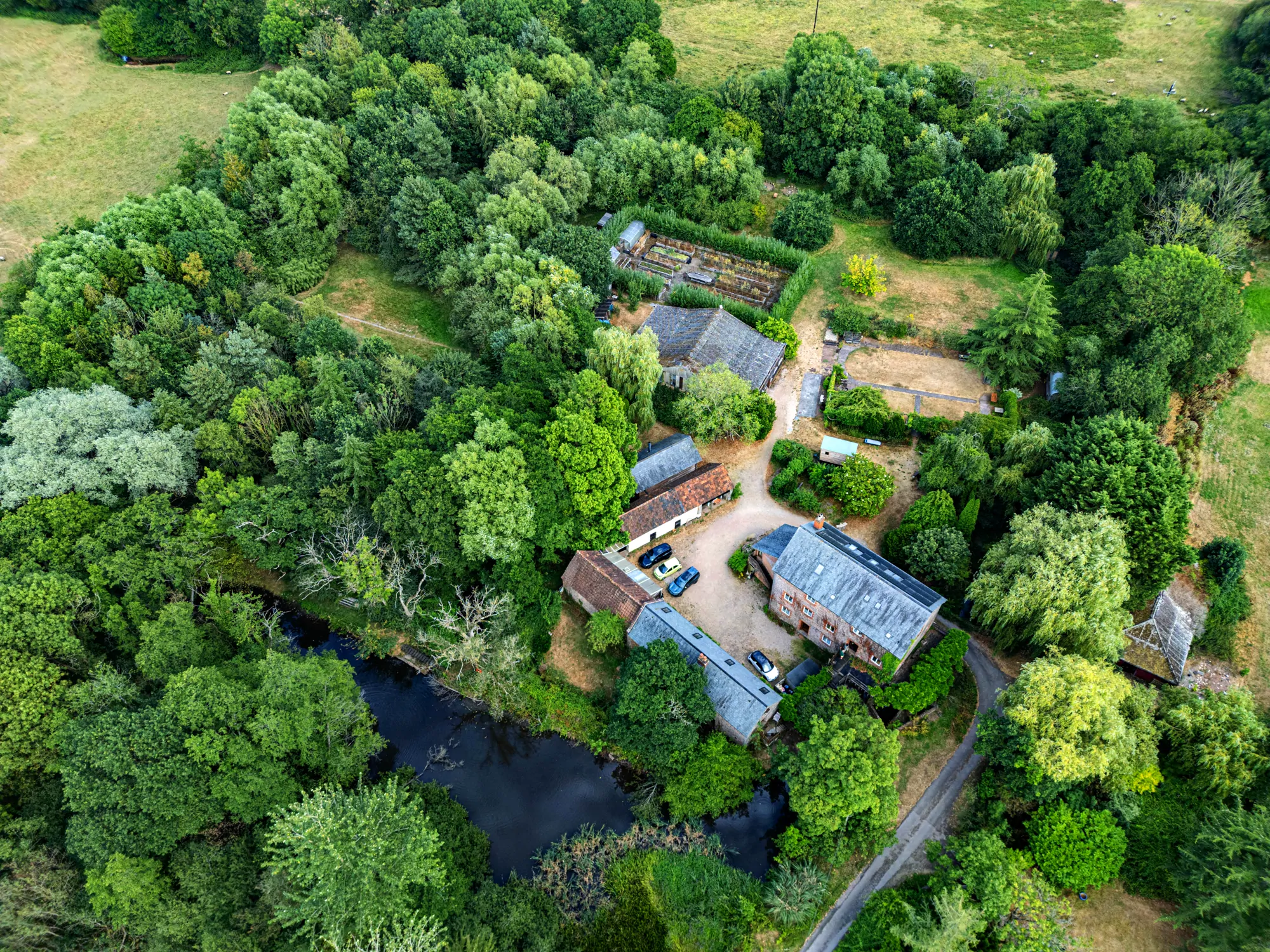 The estate from above, the Mill, gardens and woodland laid out